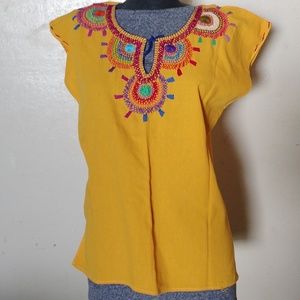 Typical women yellow blouse from Oaxaca